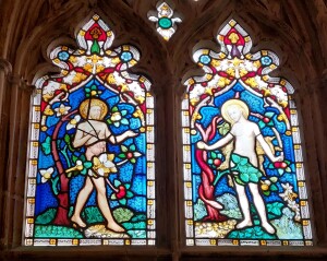 Adam and Eve in cloister stained glass, after the events in The Creation